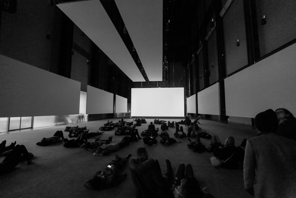 people sitting on floor inside building