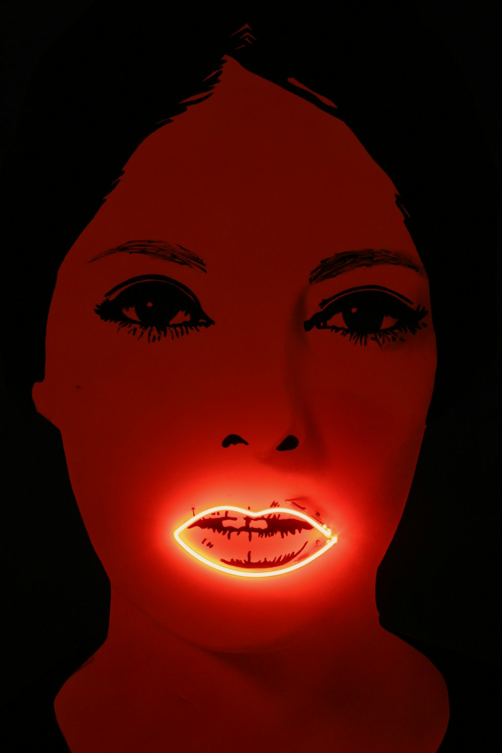 woman with red lipstick and yellow eyes
