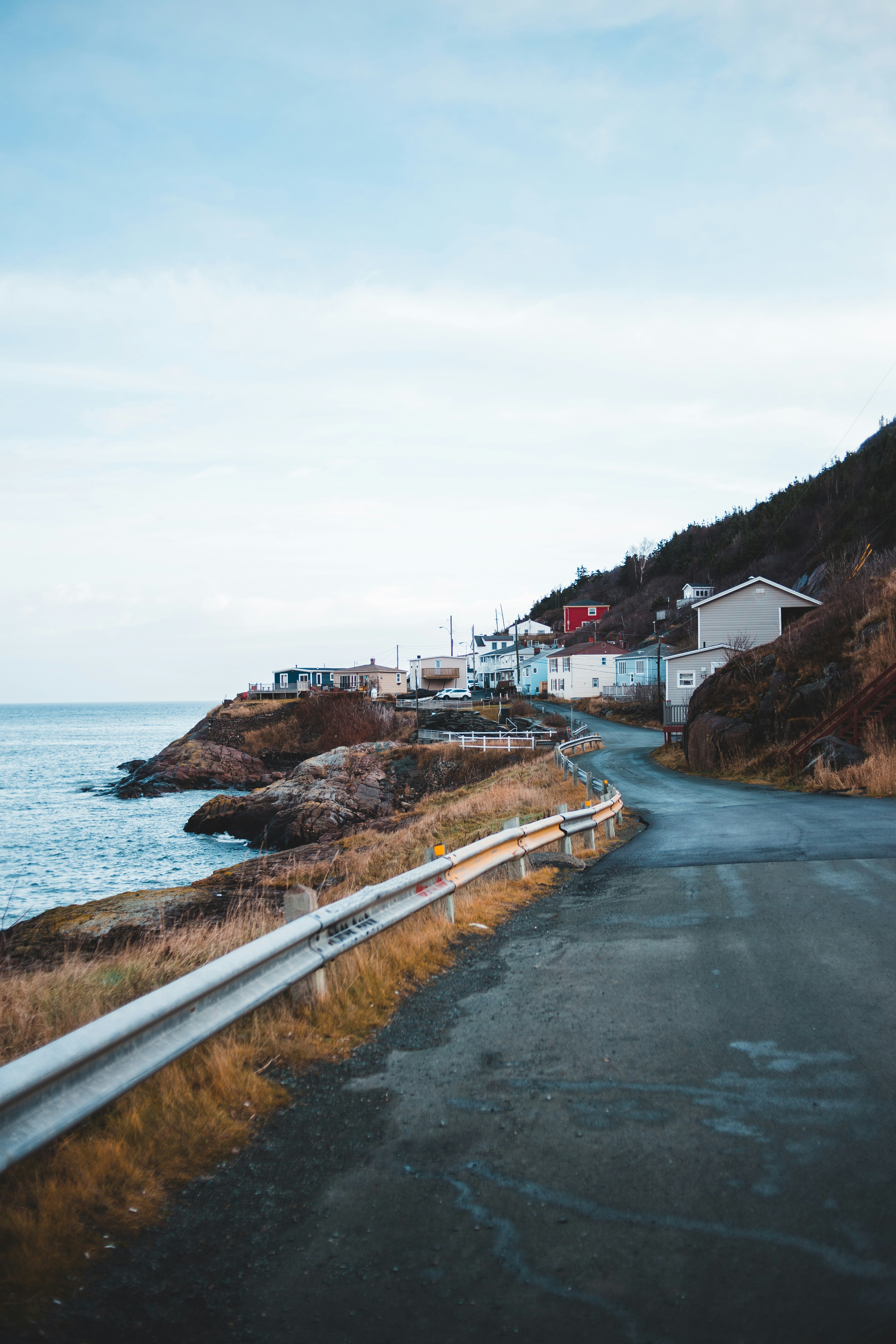 houses near body of water during daytime