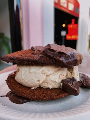 An artisan ice cream sandwich made with homemade cookies and rich caramel ice cream.