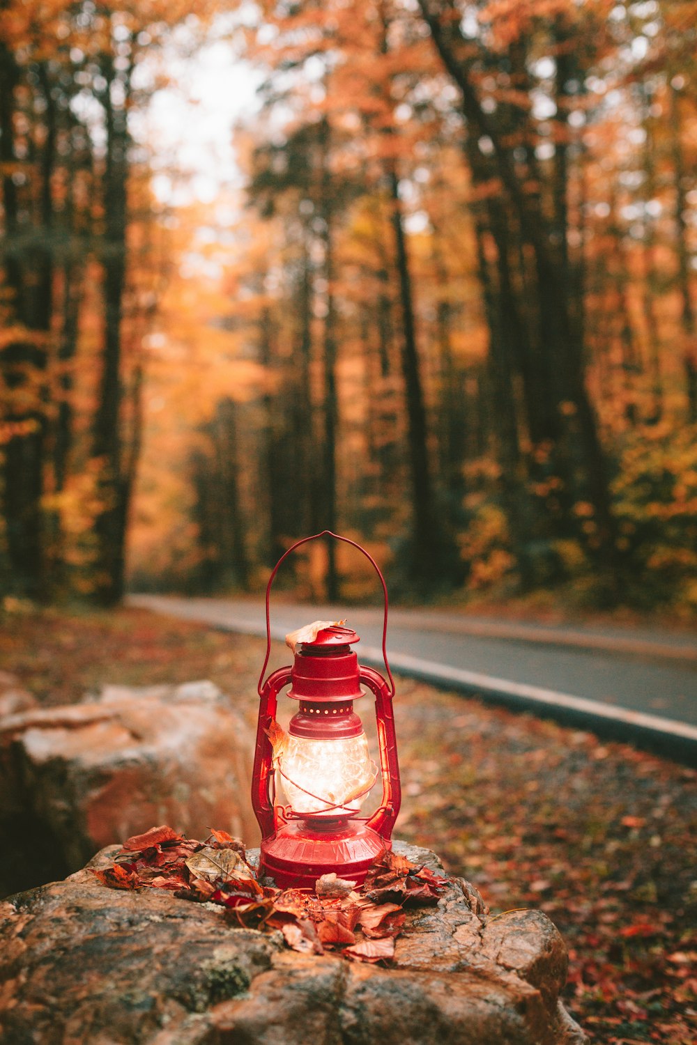 red fire extinguisher on brown soil