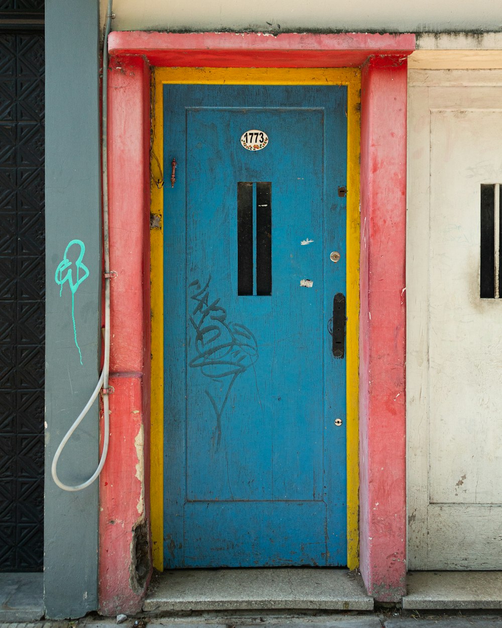 blue and red wooden door