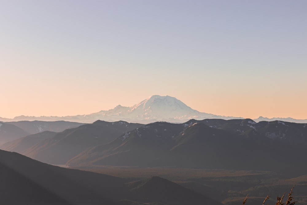 snow covered mountain during daytime