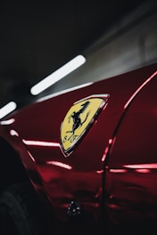 red car with yellow and black logo