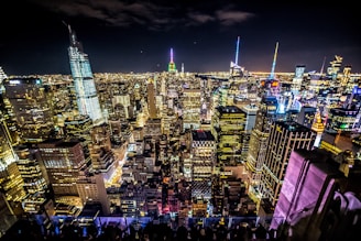 A vibrant cityscape of New York City featuring iconic landmarks and bustling streets.