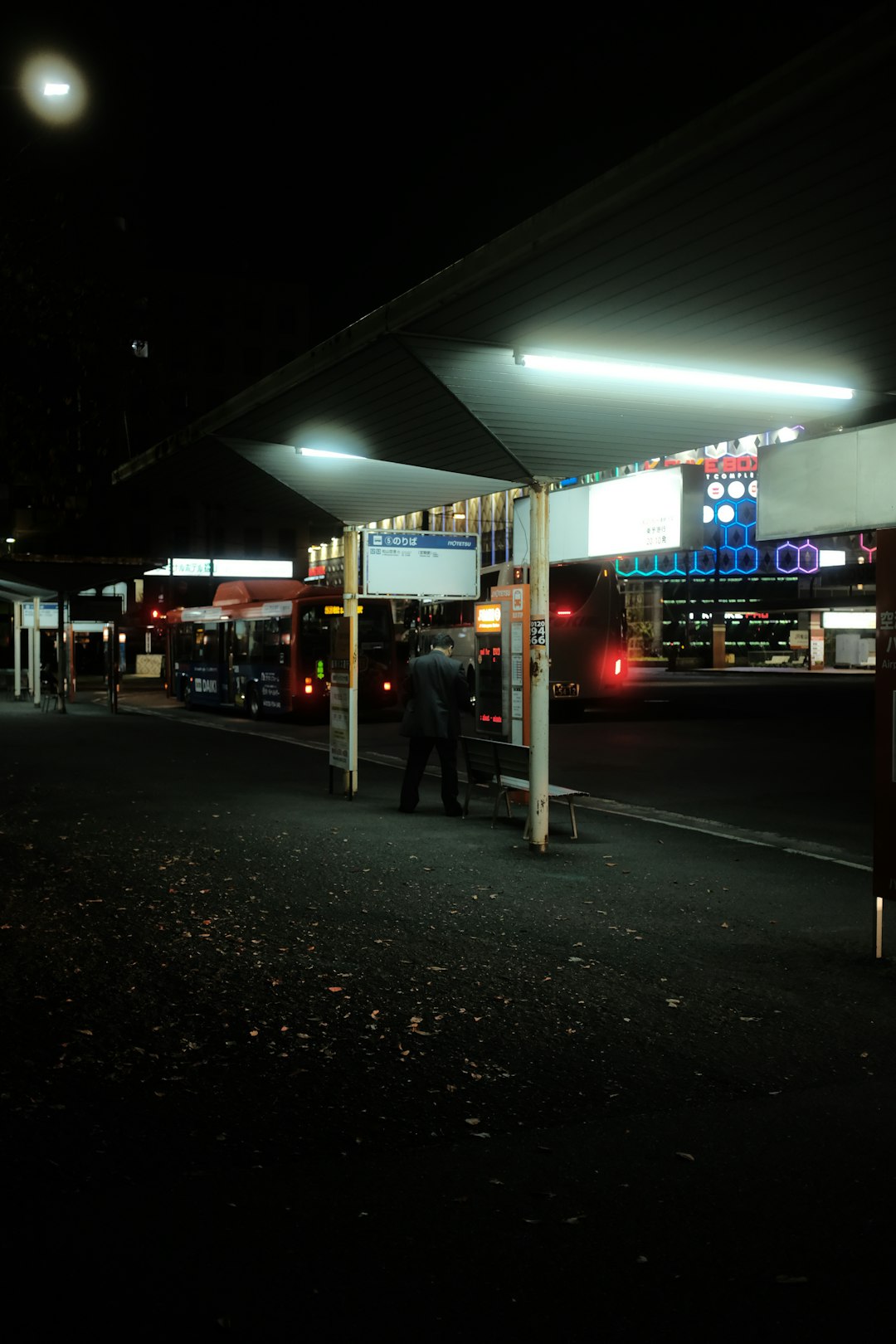 white and red store front during night time