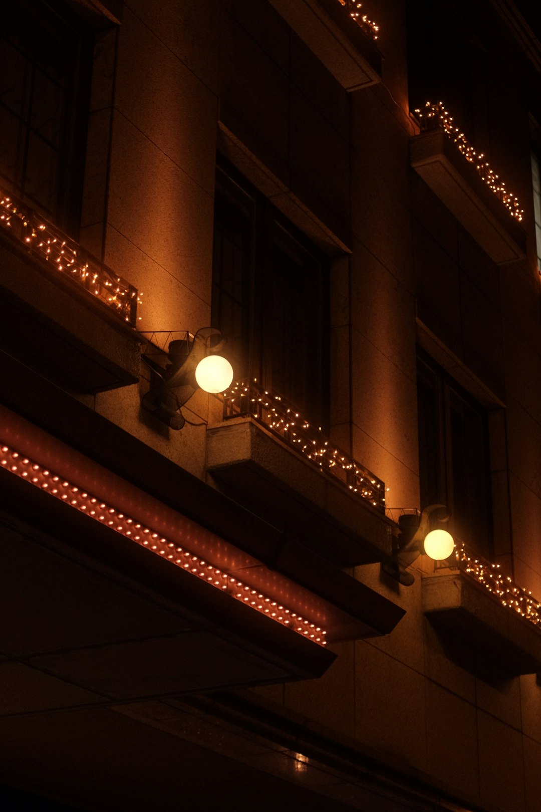 white pendant lamp turned on during nighttime