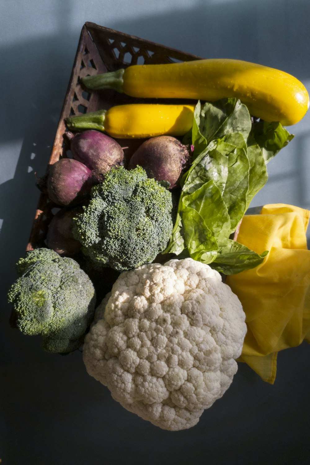 yellow banana fruit beside green broccoli and yellow banana