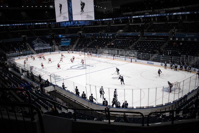 Ice hockey players battling for the puck during an arena game