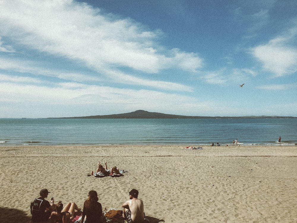 people on beach during daytime