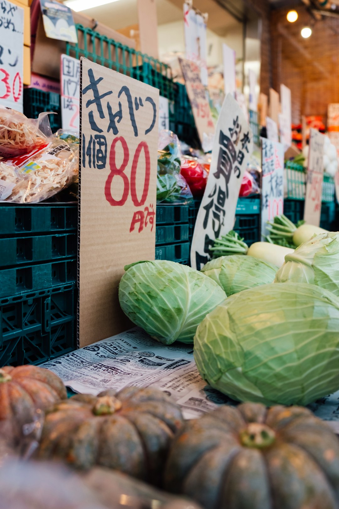 green cabbage on brown wooden table