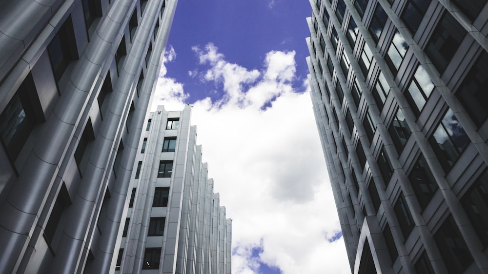 white and black concrete building under blue sky during daytime