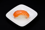orange and white bread on white ceramic plate
