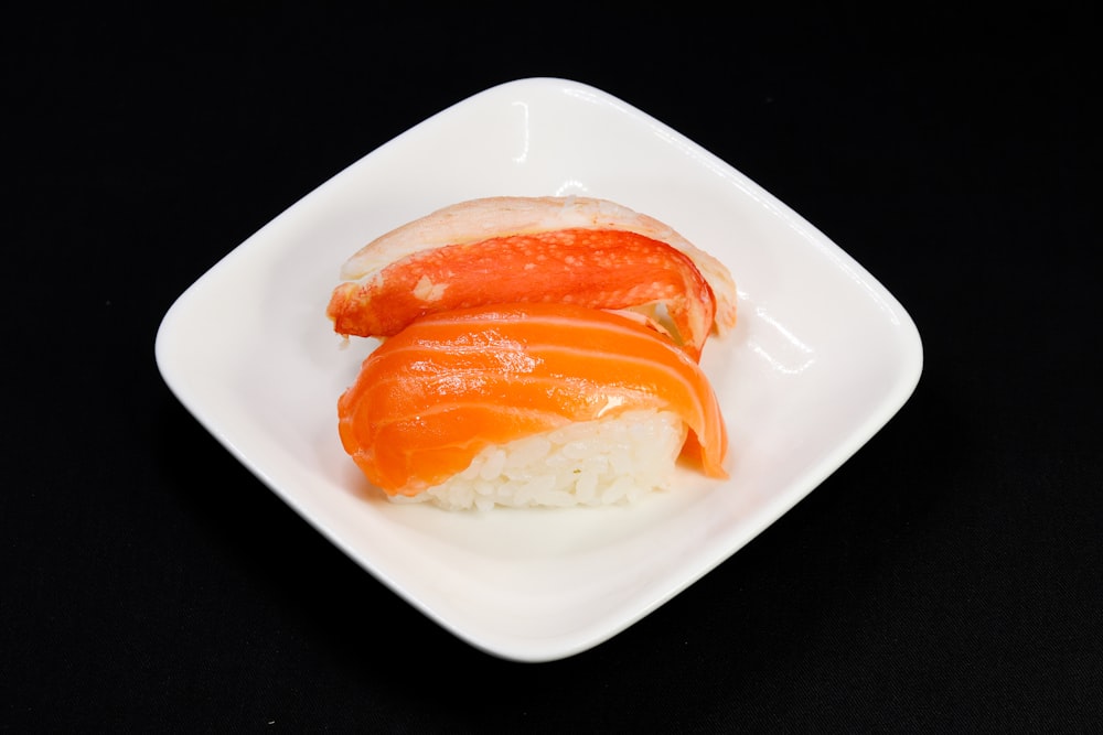 sliced tomato on white ceramic plate