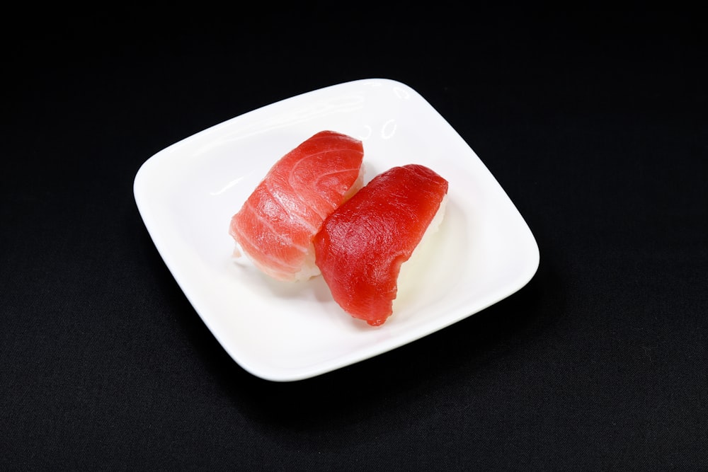 sliced tomato on white ceramic plate