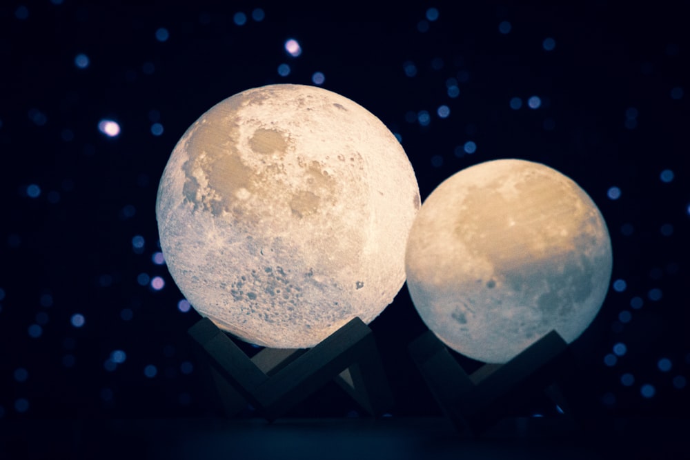 two white and blue moon illustration