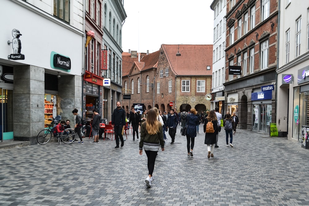 people walking on street during daytime