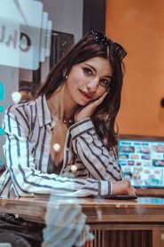 woman in blue and white plaid dress shirt