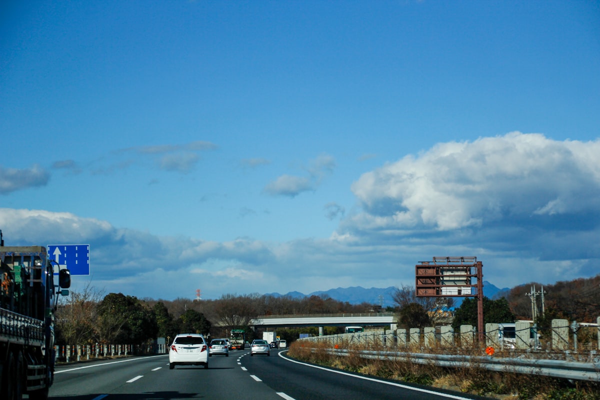 Cars driving on a highway during daytime