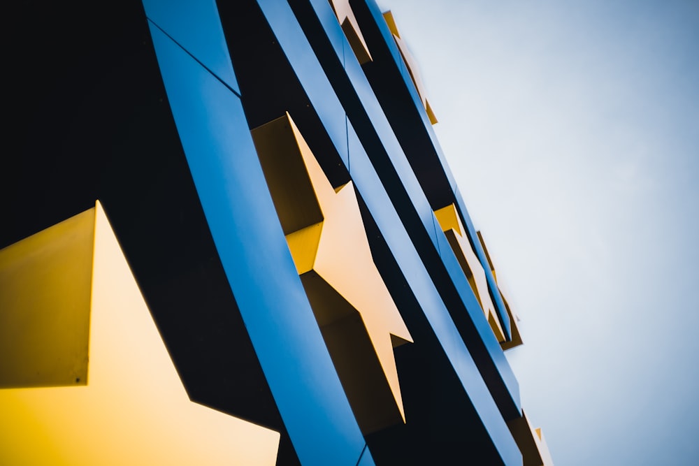 blue and yellow building under blue sky during daytime