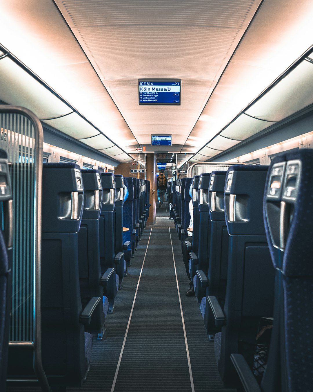 white and blue train seats