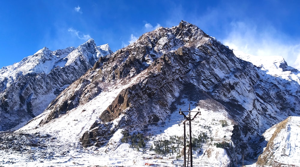 black cross on top of mountain