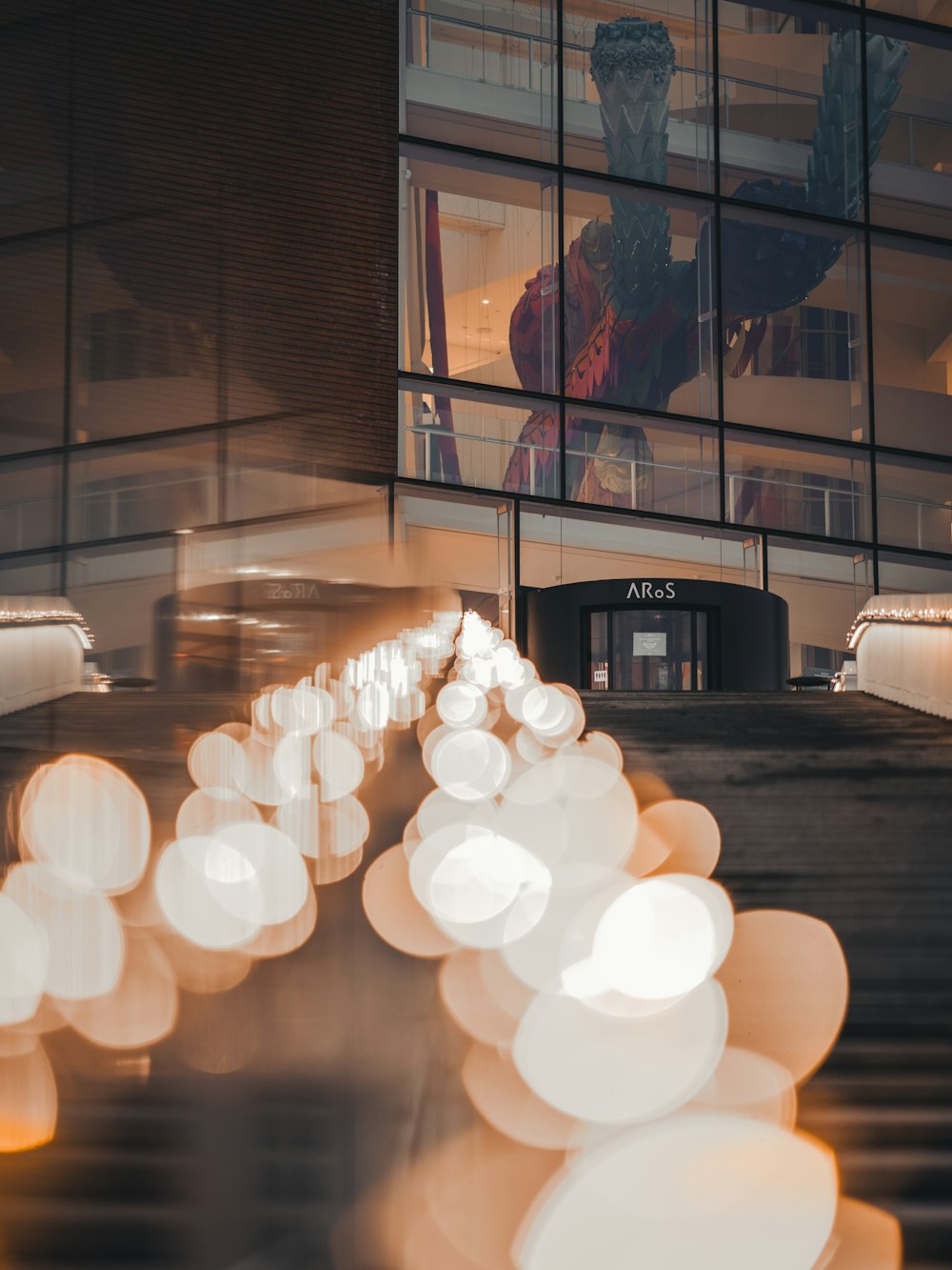 white pendant lamps turned on during night time