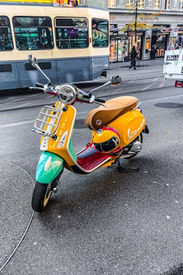 A vibrant electric scooter on a sunny street.