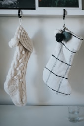 white knit socks on white table