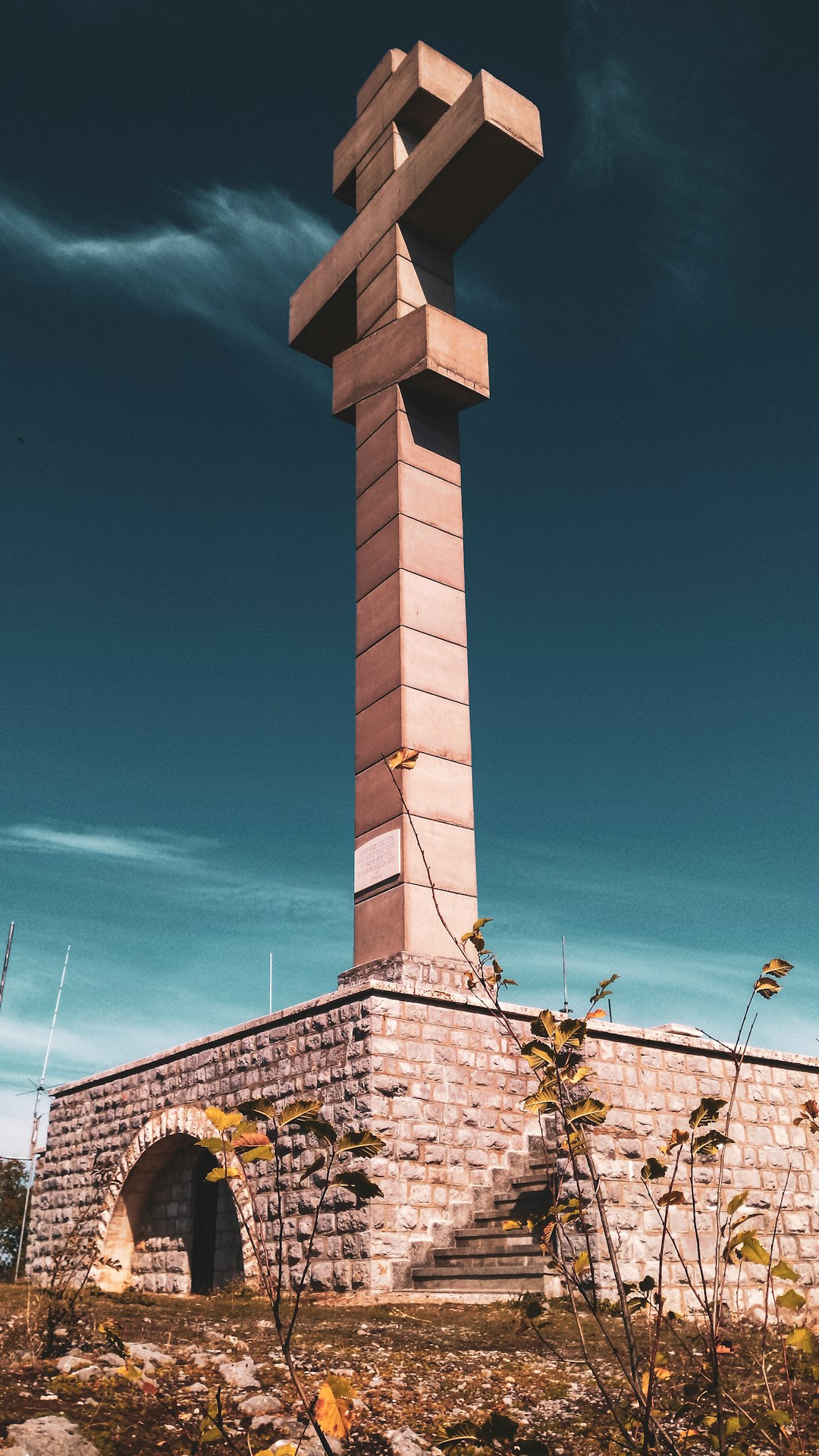 white concrete tower under blue sky during daytime