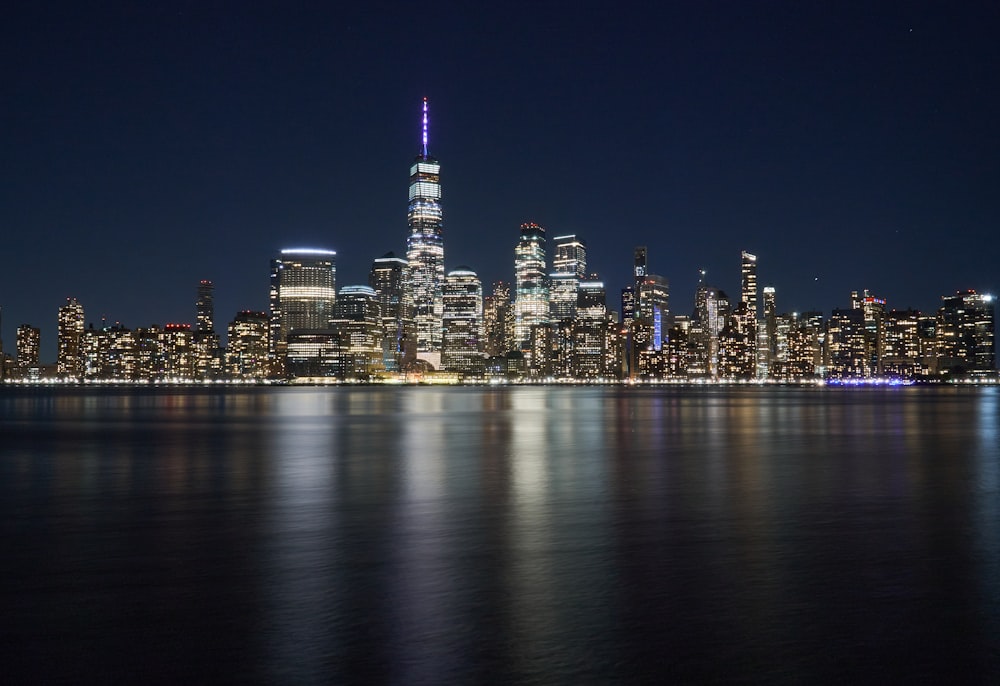 city skyline during night time