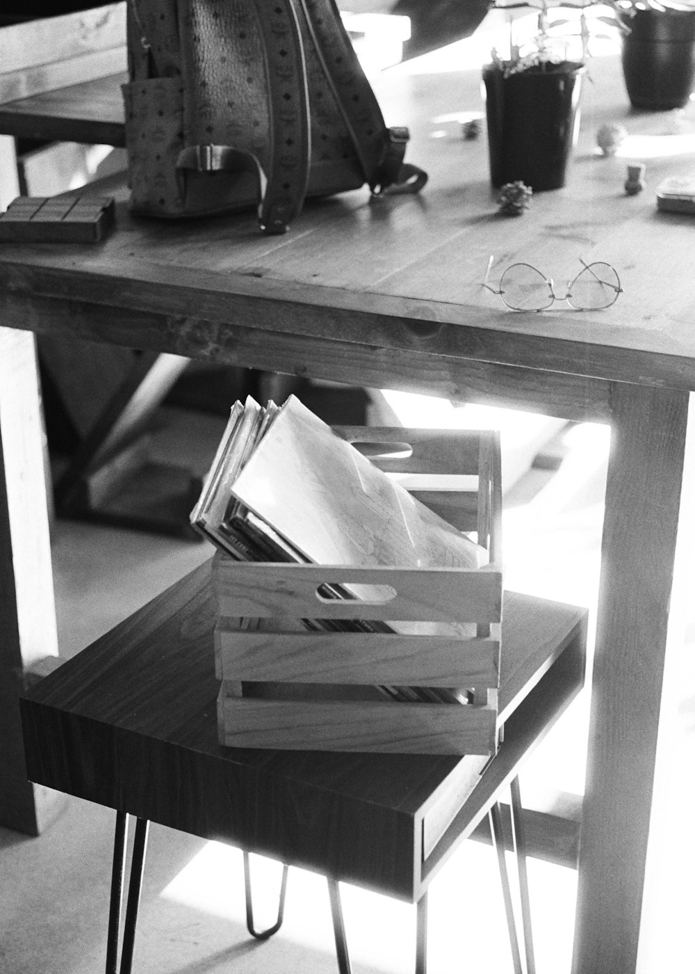 grayscale photo of wooden table