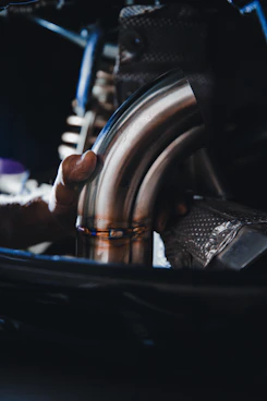 person holding black steering wheel