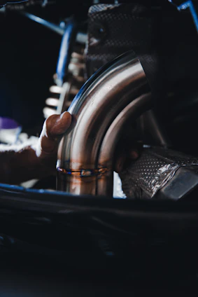 person holding black steering wheel