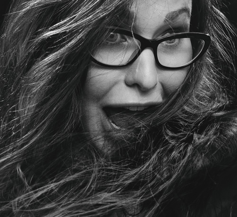 woman wearing black framed eyeglasses