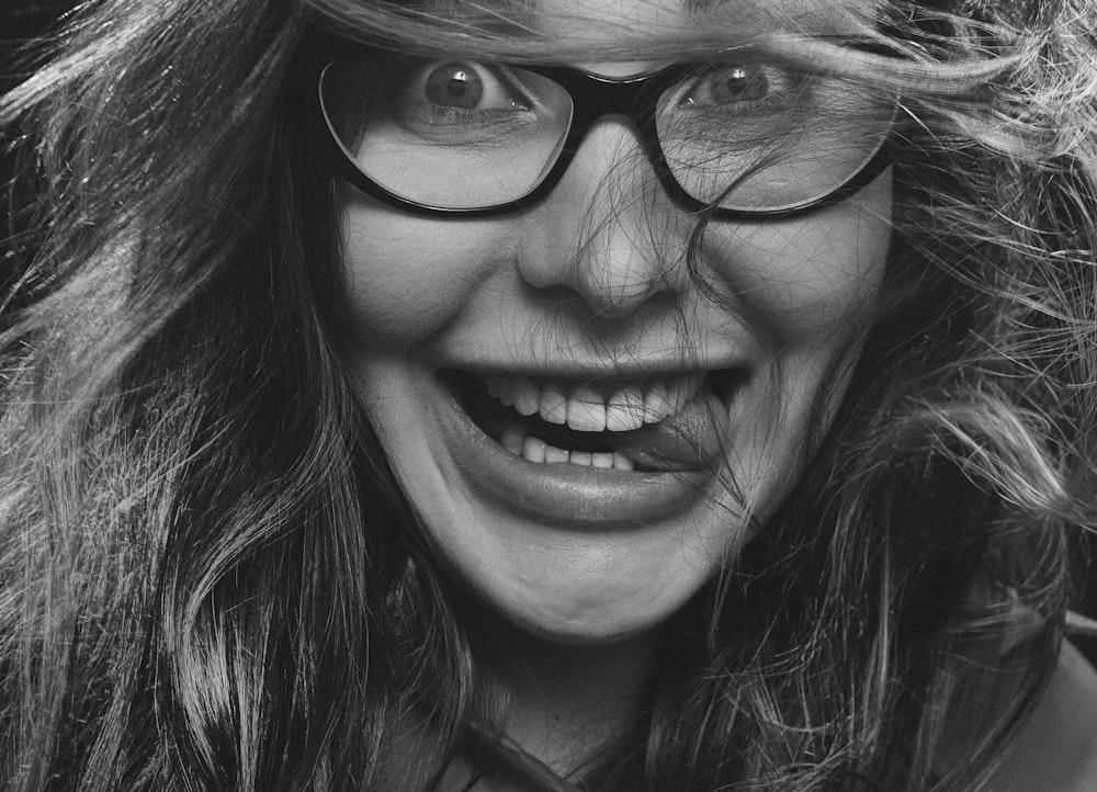 woman wearing black framed eyeglasses