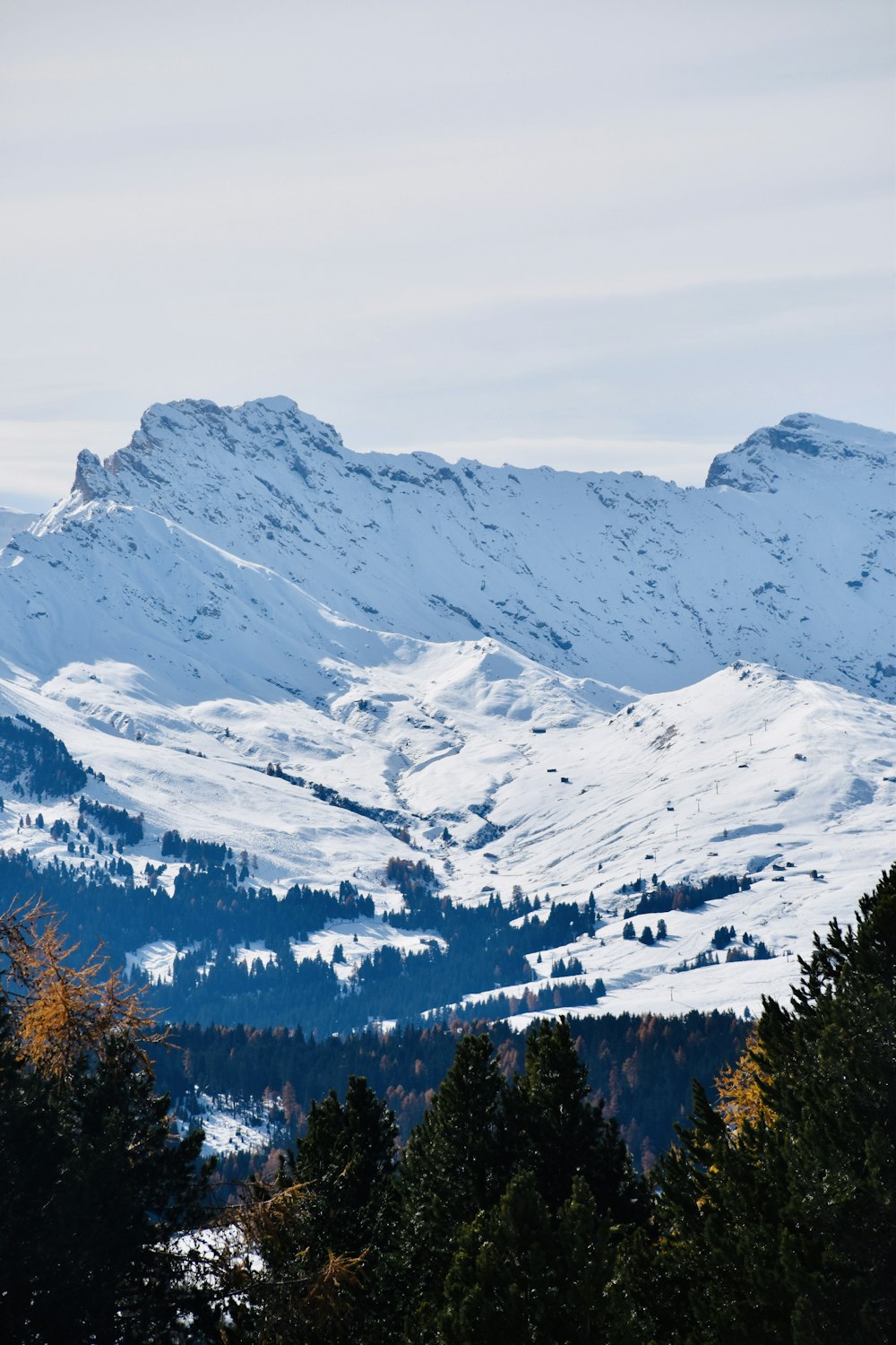 snow covered mountain during daytime