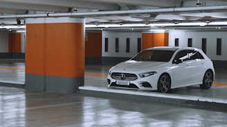 white bmw m 3 parked in garage