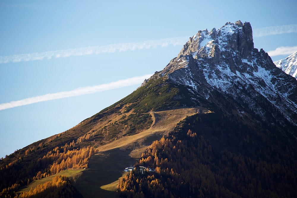 green and brown mountain under blue sky during daytime