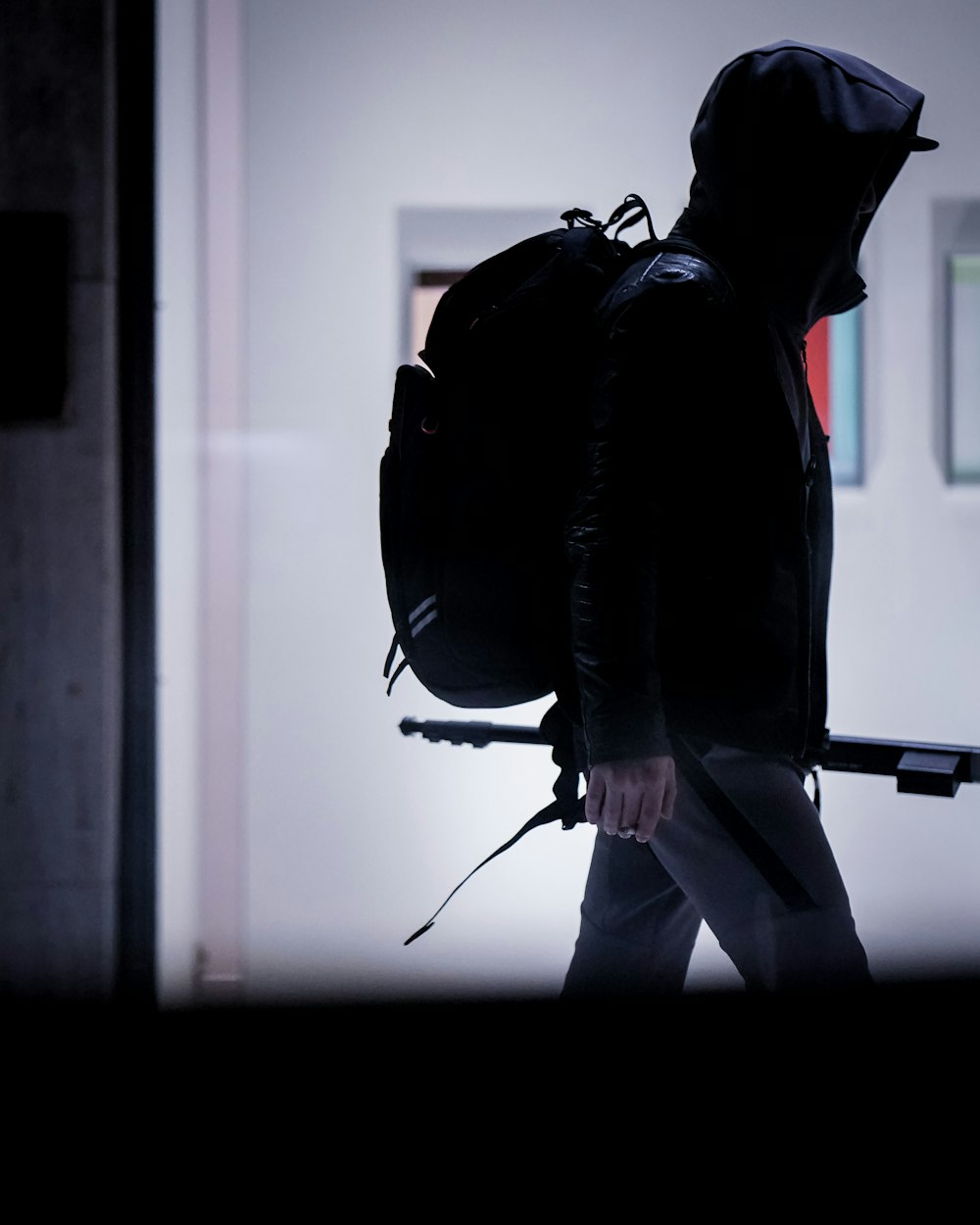 man in black jacket and white pants wearing black helmet