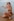 woman in black panty kneeling on beach