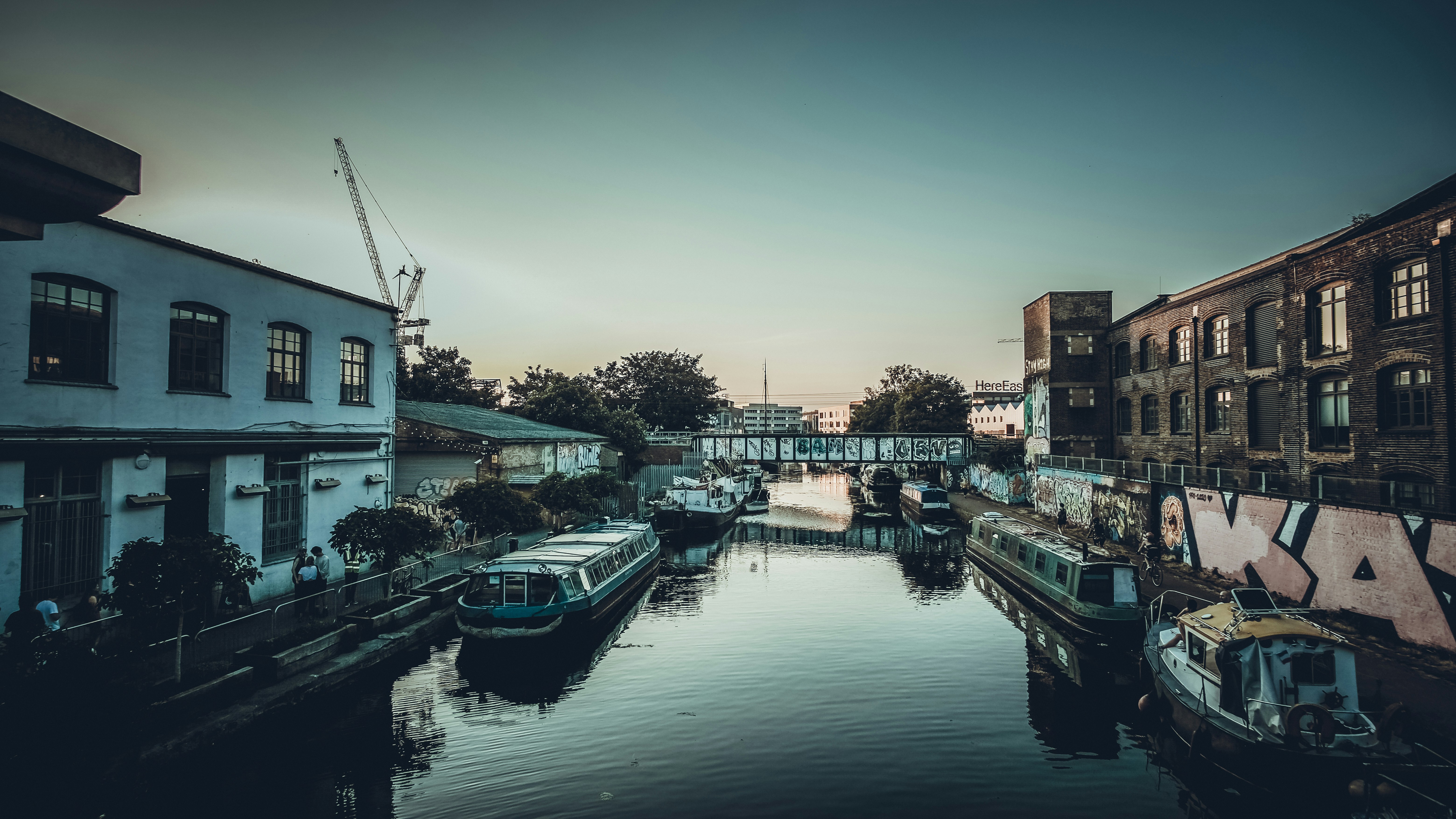 White and blue boat on river during daytime photo Free Hackney wick