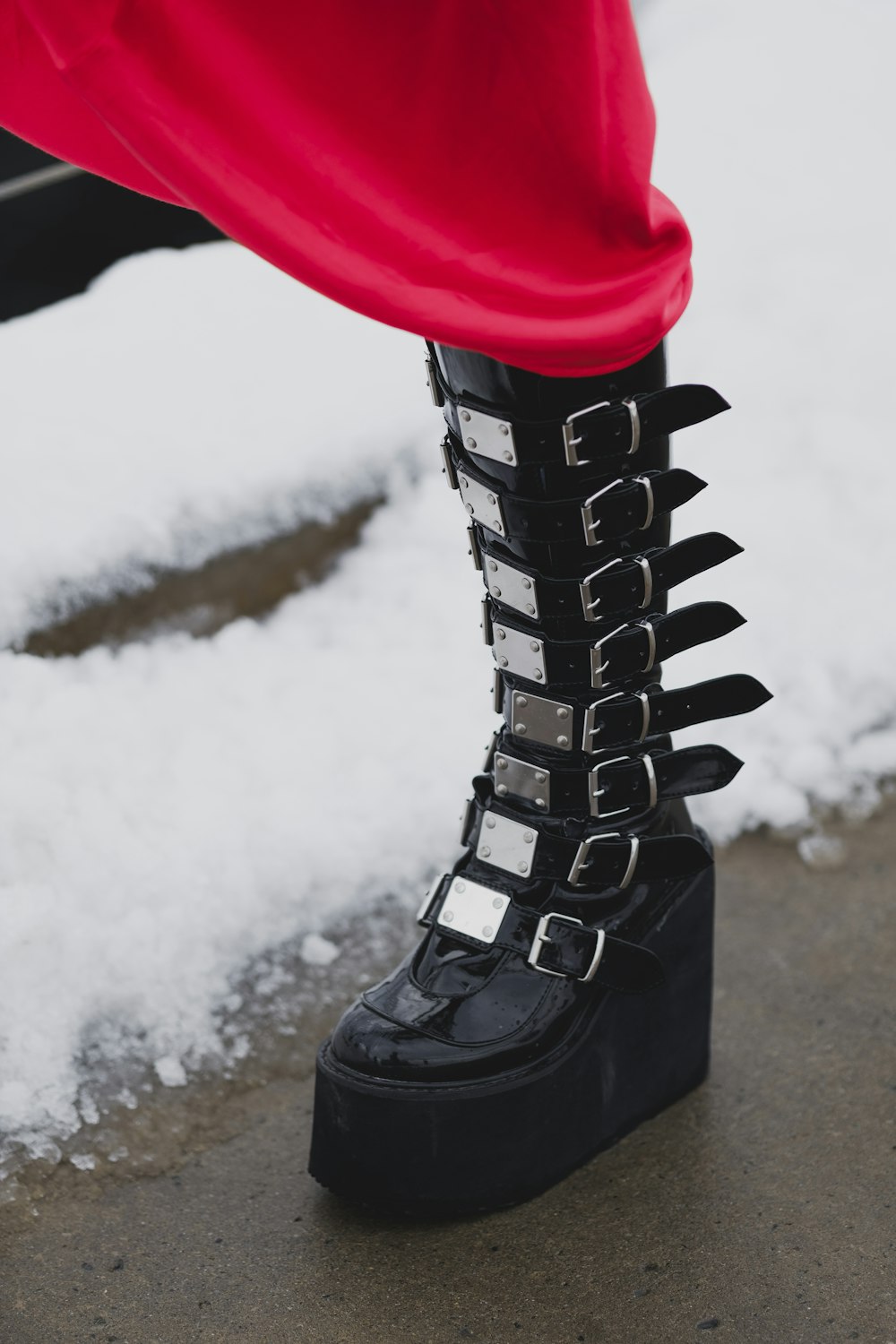 Person wearing black leather boots photo – Free Canada Image on Unsplash