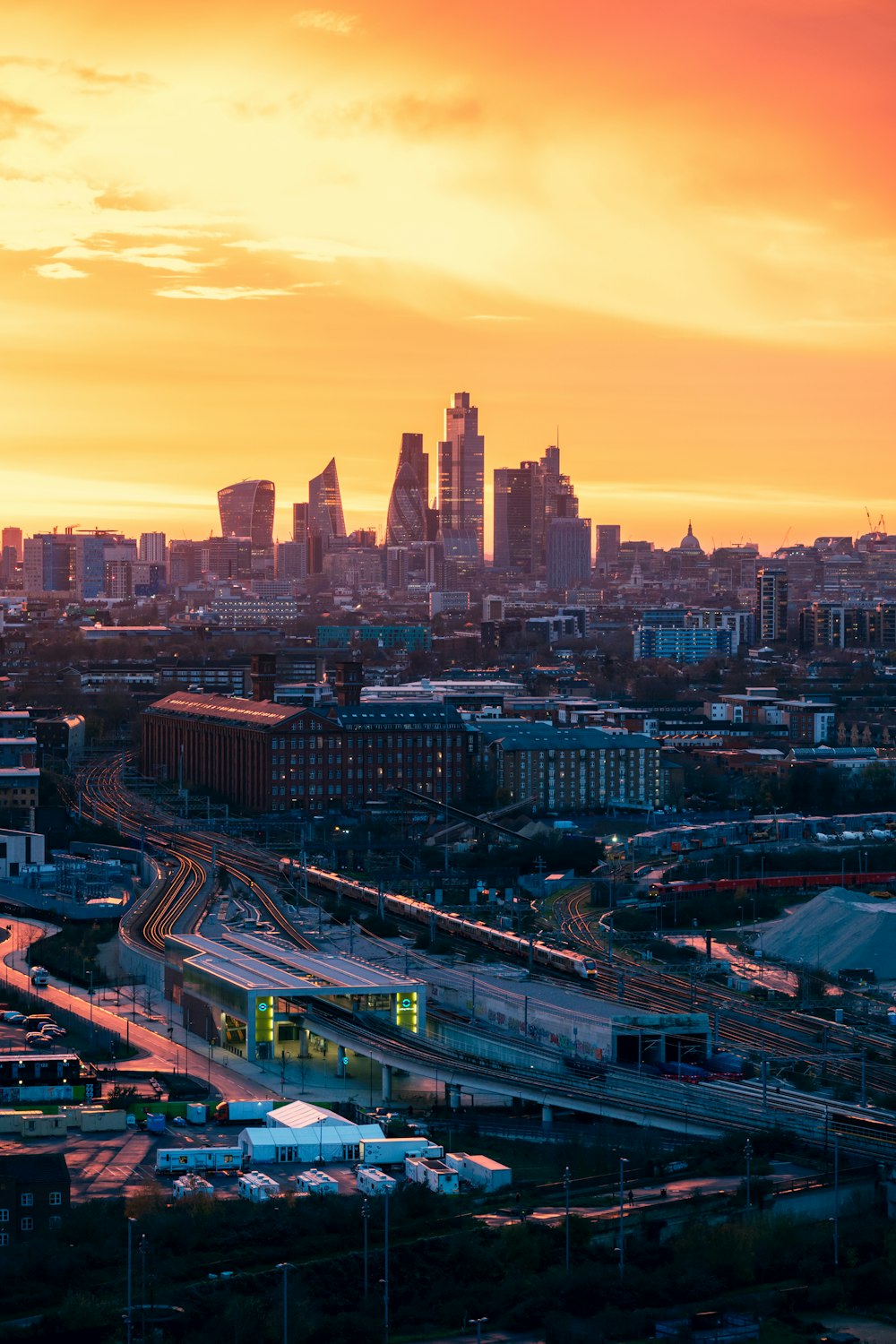 aerial view of city buildings during sunset