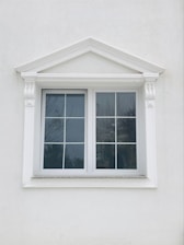 white wooden framed glass window