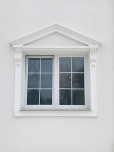 white wooden framed glass window