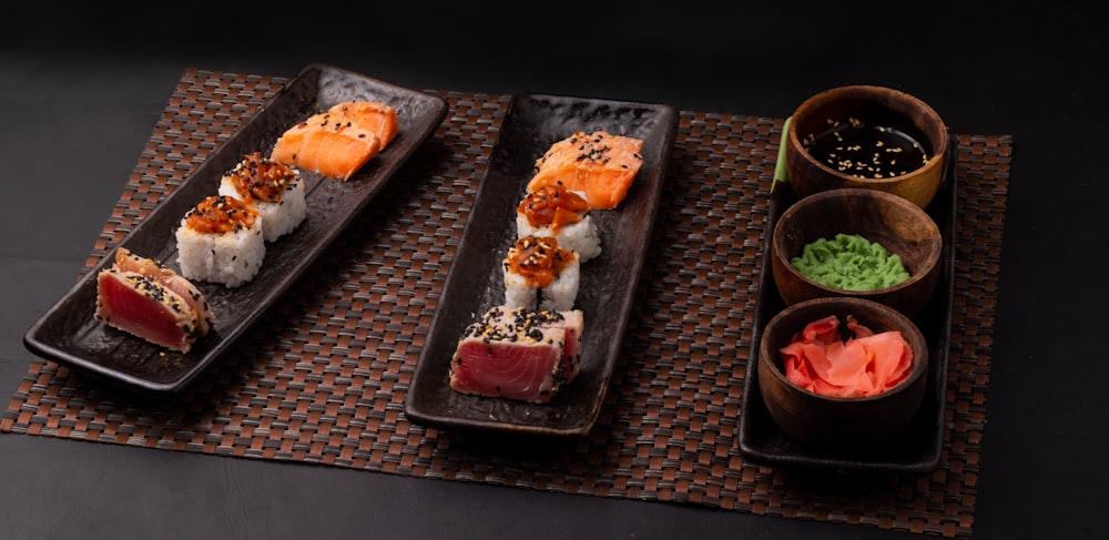 brown and white pastry on black rectangular tray