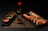 A beautifully arranged sushi platter on a wooden table.