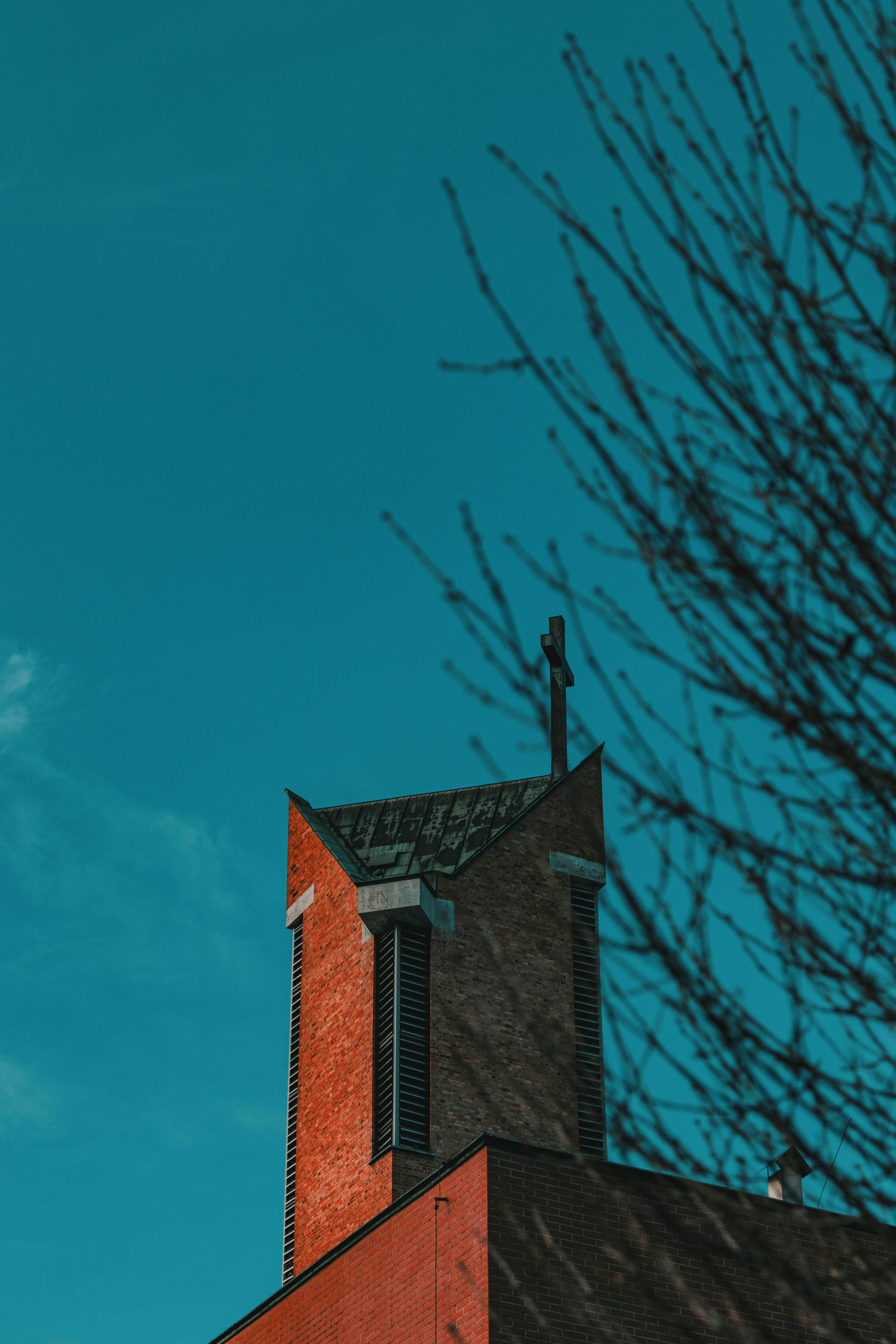 brown brick building under blue sky