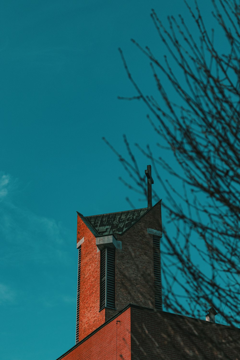 brown brick building under blue sky